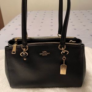 Coach pursue. Never Used. In perfect shape. Comes from smoke free home.